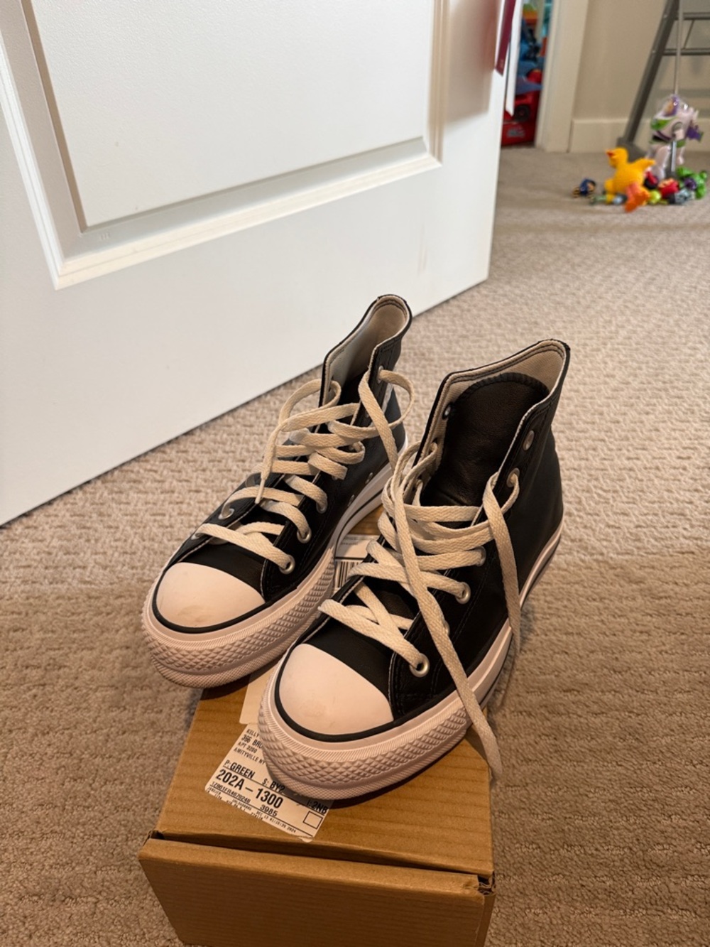 Converse Black and White High Top Sneakers